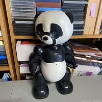 Full frontal shot of the robotic panda toy showing overall condition and design details.