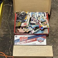 Open Topps 2011 Baseball Diamond Anniversary box filled with loose sports cards