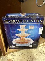 Front of the Rival Beverage Fountain box showing the product image and branding.