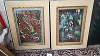 Two framed lithographs side by side, showing full lot and frames.
