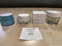 All four jars displayed with MaxSold lot tag