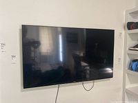 Front view of TV mounted on wall