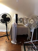 Group shot of all six fans including pedestal, tower, desk, and window models