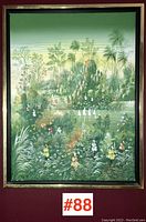 Front view of framed tropical scene painting showing multiple small figures among dense green vegetation.