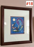 Overall view of framed print on wall