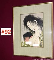 Front view of the framed Japanese print showing the artwork and the condition of the frame and matting.