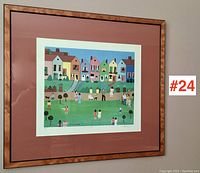 Framed serigraph print on wall with visible crease in mat on left side