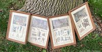 Four framed occupational prints placed outdoors against a tree, showing various crafts and tools in each.