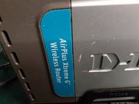 Close-up photo of the side label indicating AirPlus Xtreme G Wireless Router technology.