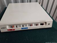 Front panel view showing power switches labeled with outlets and power LED.