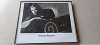 Full view of the framed 8x10 black and white photograph of Mandy Barnett with autograph in black ink.