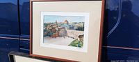 Framed artwork of Jerusalem showing the Dome of the Rock and its surrounding cityscape, matted and signed by the artist.