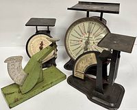 Four vintage scales arranged together including Triner postal and parcel scales, and two egg grading scales.