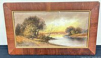 Framed landscape watercolour painting on board, showing the overall view and condition of the frame.