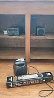 Velbon Digital Tripod MAXi343E boxed, Black small electric heater, Yamaha CRX 040 CD receiver and speaker on wood floor