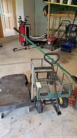 Overview of garden wagon, platform dolly and leaf rake together