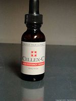 Front view of Cellex-C High-Potency Serum bottle showing label with product name, volume, and brand logo.