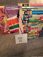 Stack of 21 various Archie Comics including different series like Jughead's Double Digest, Betty & Veronica, and Veronica's Passport.