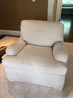 Front view showing seat and back cushions with rolled arms