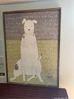 Full frontal view of framed dog wall art hung on wall