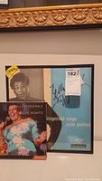 Framed signed Ella Fitzgerald album cover with limited edition CD book in front