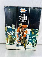 Front cover showing black hardcover with Esso logo, NHL Power Player Album title, and three player images