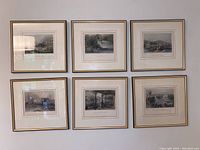 Photo of all six framed Bartlett prints arranged in two rows of three on a wall, showing overall condition and size.