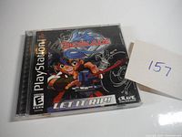 Front cover of Beyblade game in PlayStation jewel case, showing cover art and ESRB rating E