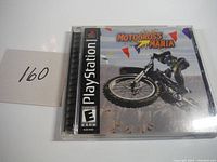 Front cover of the Motocross Mania PlayStation game case showing original artwork and ESRB rating E for Everyone.