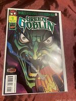 Front cover close-up of Green Goblin #1 comic showing character face and details of the collector's edition label.