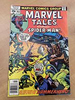 Front cover of Marvel Tales issue #93 showing Spider-Man in action with various armed characters and featuring the first appearance of Hammerhead and Doctor Octopus. Condition shows staple loosening and corner fold.