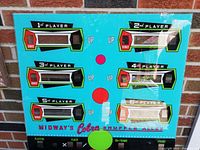 Front side of arcade backglass showing vibrant colors and detailed player scoring windows for Midway's Cobra Shuffle Alley game from 1967.