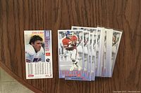 Stack of 1993 Fleer John Elway McDonald's football cards showing front and back of one card
