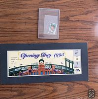 Photo showing Lou Gehrig postage stamp and the 1995 Colorado Rockies Opening Day sign