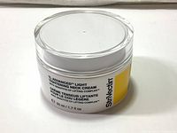 Front lid and label view of the jar showing product name and size