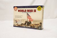 Photo of the WWII Ultimate Collection box set showing front cover with soldiers raising American flag and text indicating 24 DVDs with 30+ hours of footage.