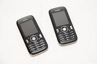 Two Huawei U1250 phones front view showing screens and keypads