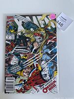 Front cover of X-Men issue 38 featuring Wolverine and Omega Red in battle.
