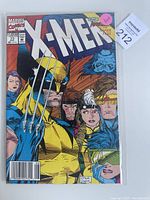 Front cover of the X-Men comic book issue #33 showing Wolverine and other X-Men characters.