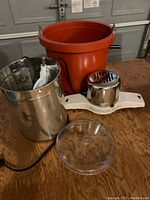 30 cup stainless steel percolator with clear lid and electric cord on wooden surface