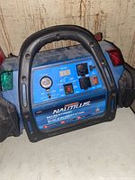 Full view of the Nautilus Motomaster Recreational Power Pack showing front panel, handle, and clamps.