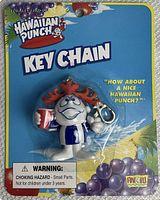 Photo of new vintage Hawaiian Punch keychain in original blue packaging with branded graphics and warnings.
