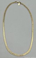 Full view of vintage Park Lane gold-tone necklace laid flat showing link design and clasp.