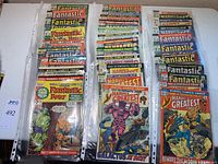 Three columns of various Fantastic Four and Marvel’s Greatest Comics issues secured in sleeves