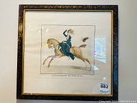 Framed antique French print 'Les Inconvenient Perruques' with detailed hand-colored illustration in decorative frame.