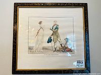 Full view of the framed antique print showing man, woman and child in historical dress