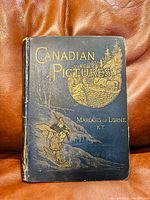 Front cover of the book 'Canadian Pictures' showing title and decorative illustration with wear on spine and edges.