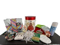 Wide shot of the Christmas decor lot items arranged on a table, showing all included pieces.
