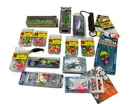 Lot of various packaged fishing lures including crankbaits, soft plastics, and spinnerbaits on display showing quantity and diversity.