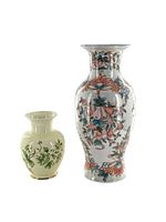 Pair of Oriental style vases shown together, smaller pale green vase and larger colorful floral vase